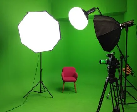 A green screen studio with complete equipment, With a red chair. Stock Photos