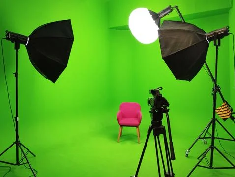 A green screen studio with complete equipment, With a red chair. Stock Photos