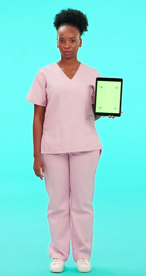 Green screen, tablet and face of woman doctor with no finger in studio for fail Stock Footage 254909426
