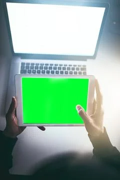 Green screen, tablet and hands in night, display and hacker of database Stock Photos