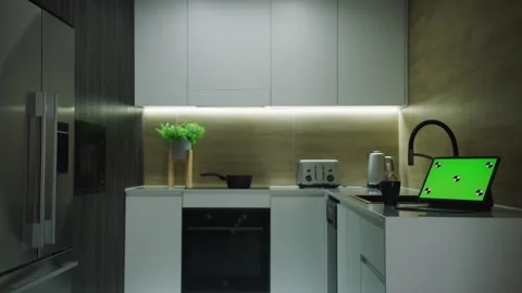 Green Screen Tablet and Kitchen Cabinets Stock Footage 264240777