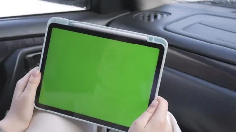 Green screen tablet in car, ready for editing Stock Footage 341475061