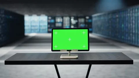 Green screen tablet in data center left running for software updates Stock Photos