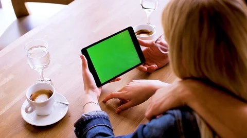 Green screen on tablet device, Young couple watching together - Mock up Stock Footage 89828408