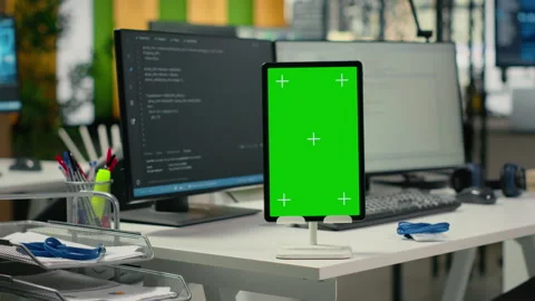Green screen tablet in empty startup office with neural network program running Stock Footage 323143346