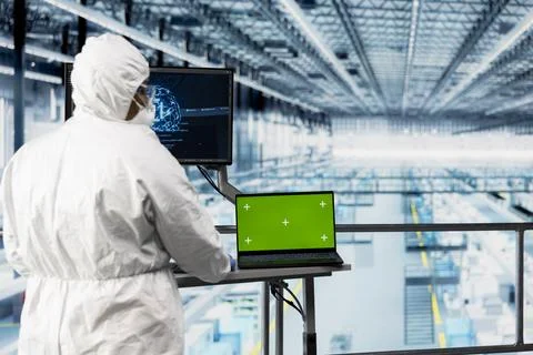 Green screen tablet, optimizing microchips and engineer man using AI Stock Photos