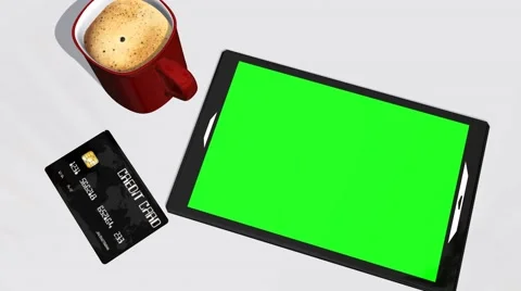 Green screen tablet PC credit card and cup of coffee - 4k Stock Footage 45925481