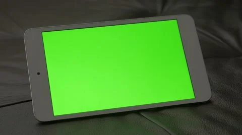 Green screen tablet PC on leather sofa 4K 2160p panning UHD footage - Smart t Stock Footage 50384949