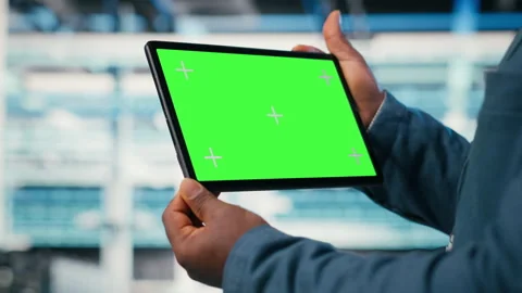 Green screen tablet used by data center worker to manage cloud computing Stock Footage 330440669