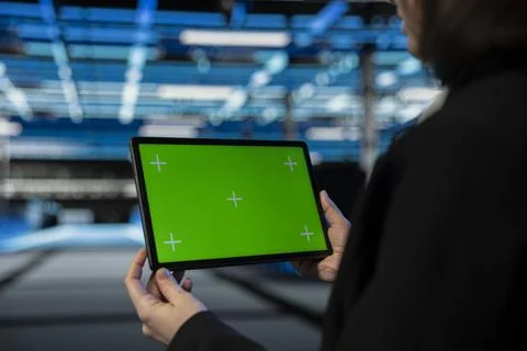 Green screen tablet used by data center technician to configure supercomputers 스톡 사진