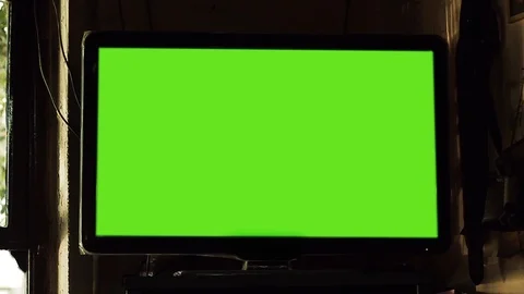 Green Screen Television Hanging in Rustic Bar Near Window, Zoom In Shot Stock-Footage 89720646