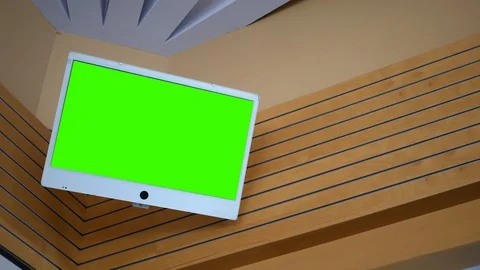 Green screen television on wall mounted stand in contemporary room Video stock 94548397