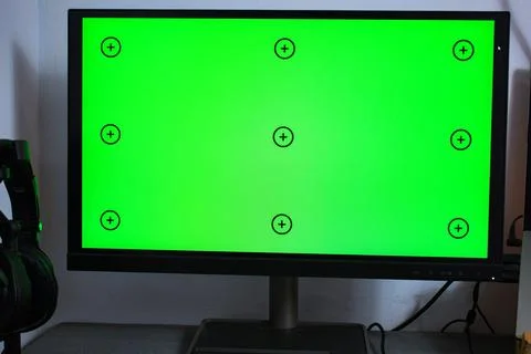 Green screen with tracking, graphic designer set up working on table Stock Photos