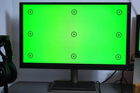 Green screen with tracking, graphic designer set up working on table Stock Photos