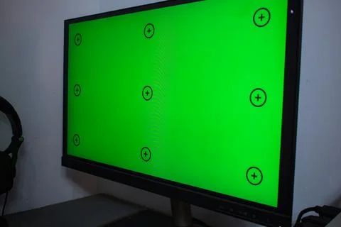 Green screen with tracking, graphic designer set up working on table Stock Photos