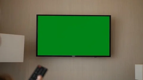 A green screen TV hangs on the wall Stock Footage 128045241