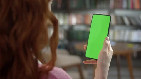 Green Screen Without Touching. Back View of Woman Holding Chroma Key Green Stock Footage 171157795