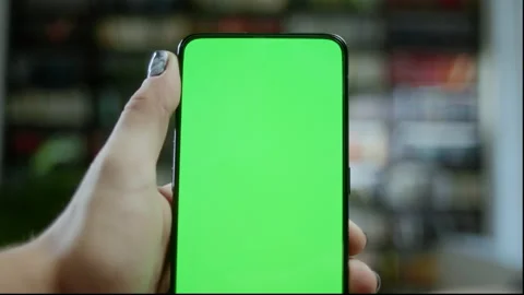 Green Screen Without Touching. Back View of Man Holding Chroma Key Green Screen Stock Footage 171166092