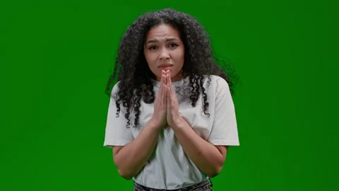 Green Screen young lady makes wish and crosses fingers for good luck Stock Footage 219304670