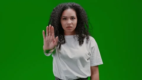 Green Screen young lady show sigh stop Stock Footage 228591551