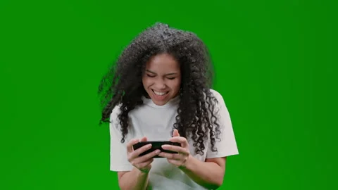 Green Screen young lady trying to pass level Stock Footage 237521650