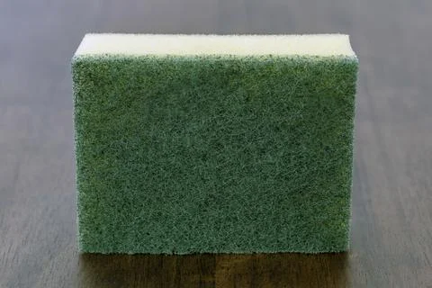 A green scrub sponge kitchen sponge cleaning sponge household scrubber dish Foto stock