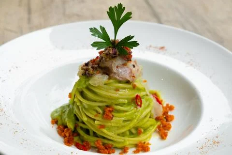 Green seafood spaghetti Stock Photos