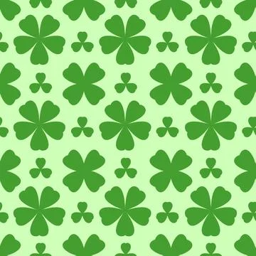 Green seamless pattern with three and four-leaf clover icons Illustrazione stock