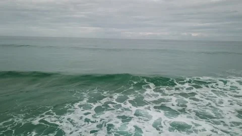 Green Seas Returning from the Wave Stock Footage 135625611