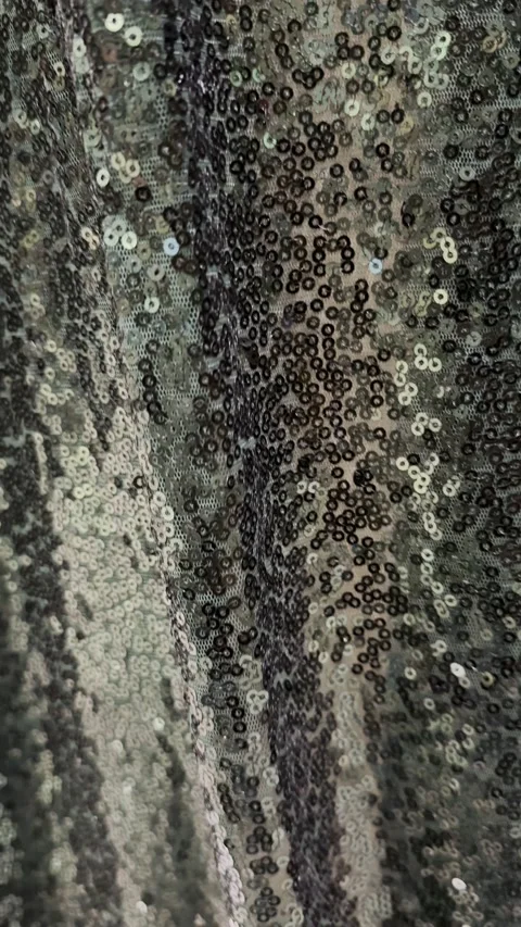 Green sequin backdrop panning up vertical Stock Footage 321766586