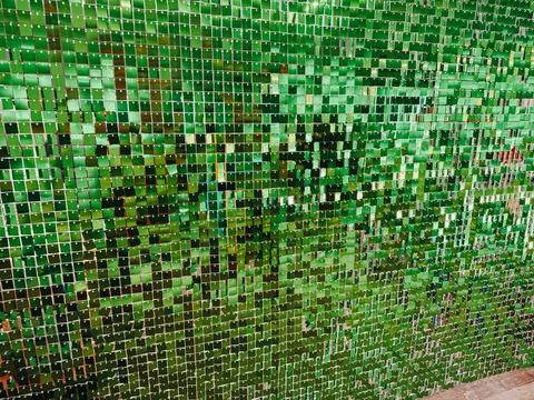 Green Sequin Wall Texture Background with Reflective Pattern 스톡 사진