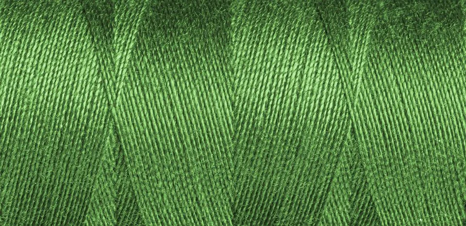 Green sewing thread texture Stock Photos