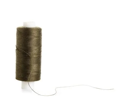 Green sewing thread on white background Stock Photos