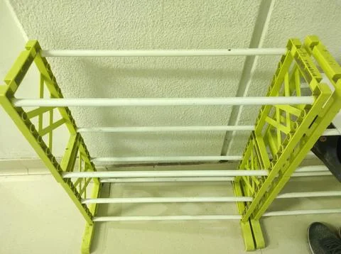 Green shoe plastic rack Stock Photos