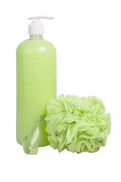 Green shower gel bottle and sponge for bath isolated on the white background Stock Photos