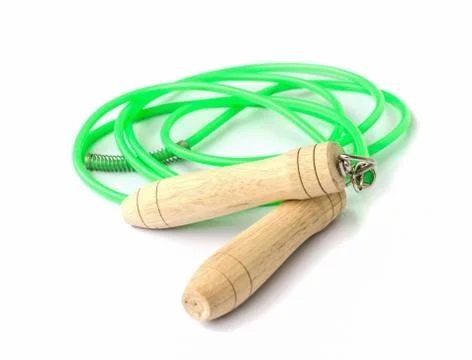 Green skipping rope. Stock Photos