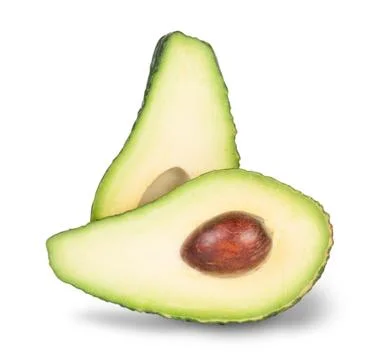 Green sliced a?avocado with bone Stock Photos