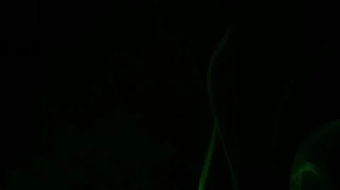 Green smoke on a black background Stock Footage 60799597