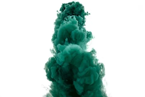 Green smoke bomb exploding against white background Stock Photos