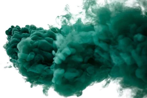 Green smoke bomb exploding against white background Stock Photos