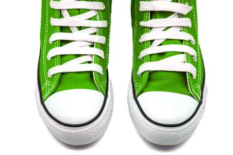 Green sneakers Stock Photos
