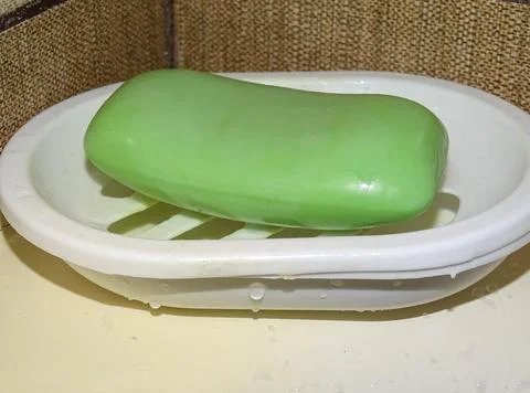 Green soap on a stand Фото