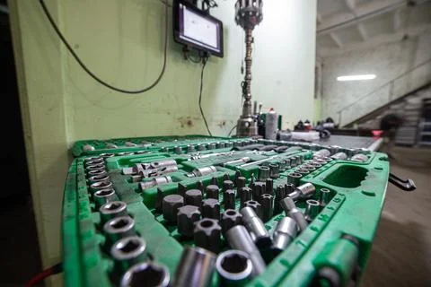 Green socket set on mechanic workbench 写真素材