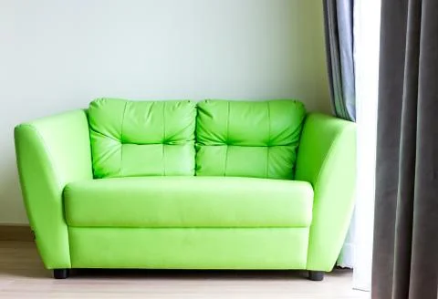 Green sofa Stock-Fotos