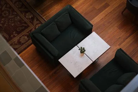 Green sofas and dining table top view  Stock-Fotos