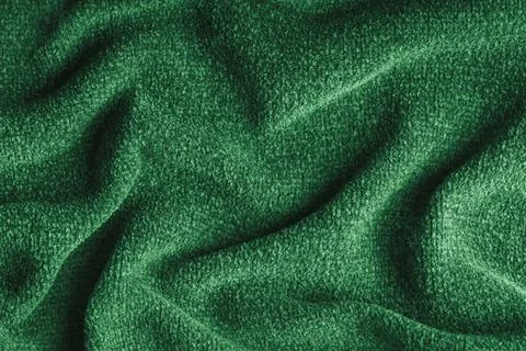 Green soft microfiber fabric texture background with folds and drapery. Bac.. Foto stock