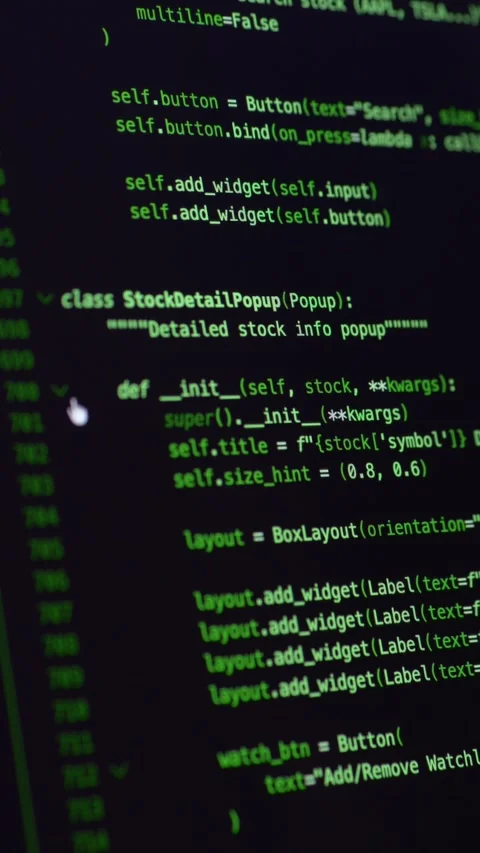 Green source code displayed on monitor during vibe coding supported by ai Stock Footage 345653362