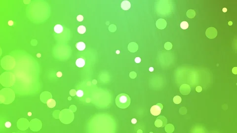 Green sparkling bokeh lights creating a vibrant festive atmosphere Stock Footage 315960632