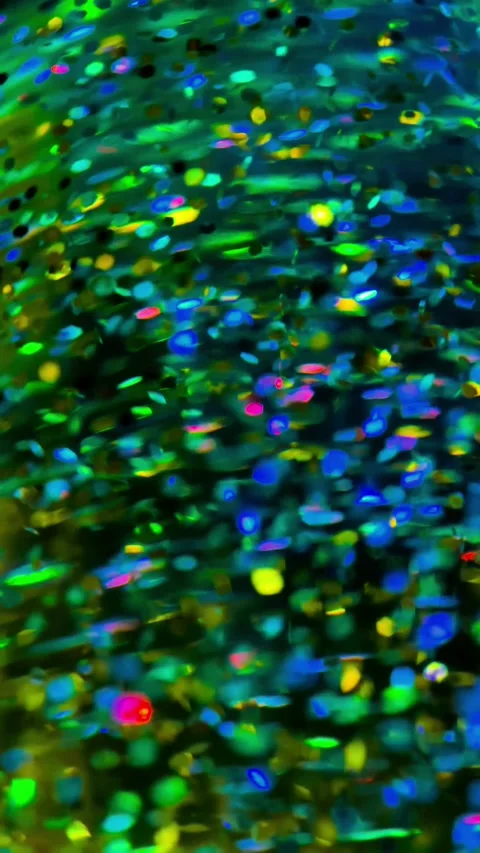 Green Sparkling Particles in 4K Slow Motion Vertical B-roll Footage Stock Footage 313359675