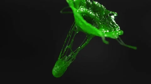 Green splash stream liquid on black bg able to loop endless Vídeo Stock 328249617
